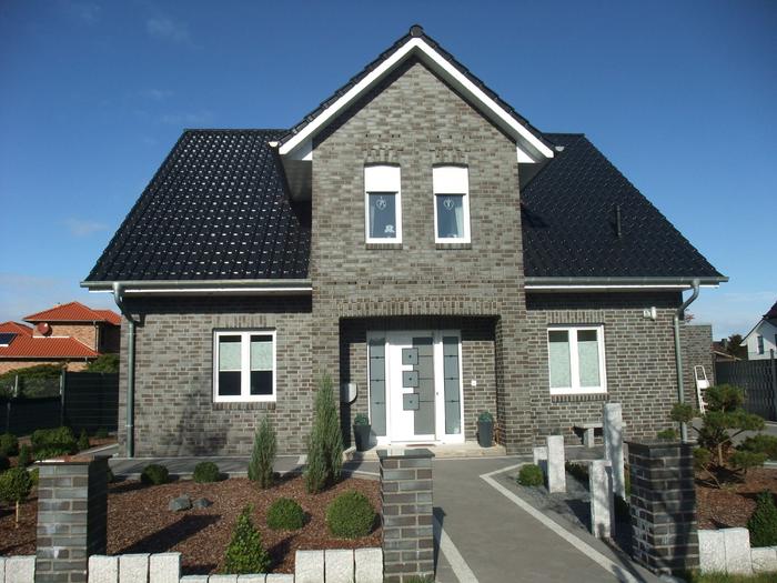 Ein schlüsselfertiges Haus in Grau